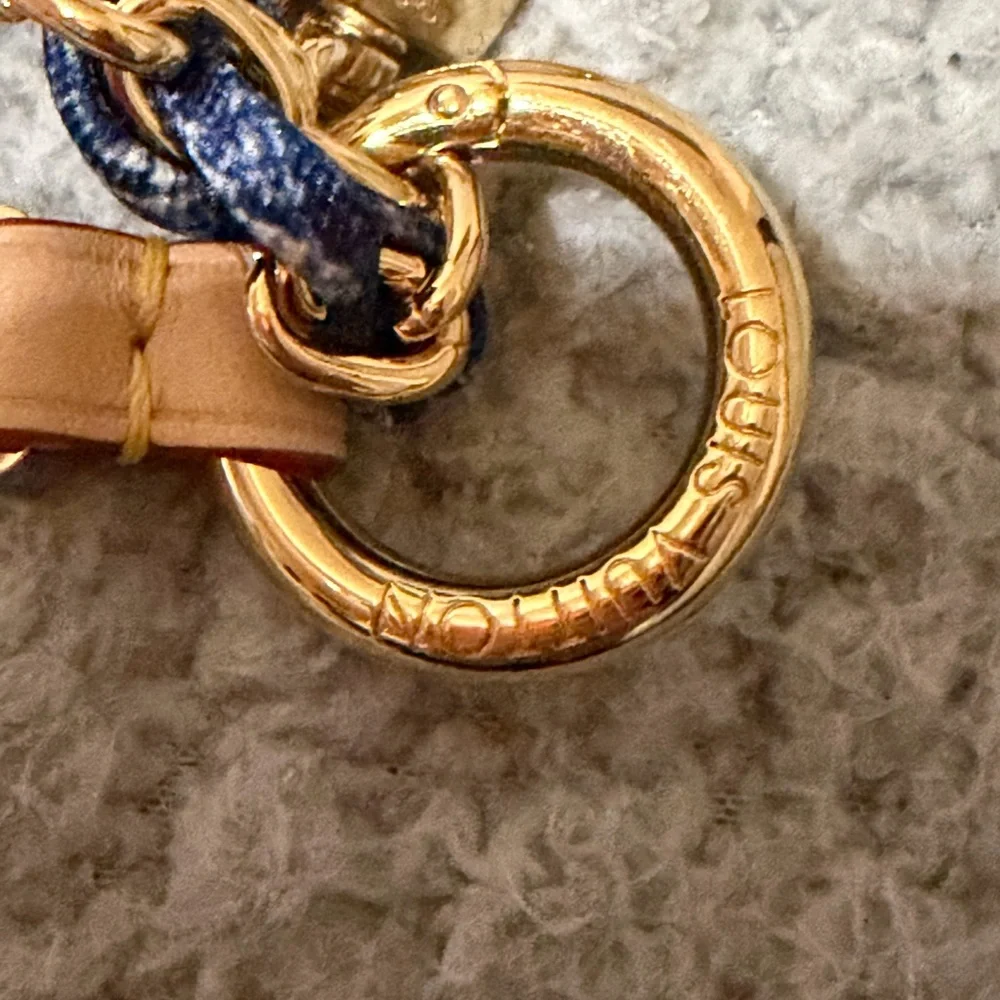 Louis Vuitton:  LV x TM Denim Cerise phone holder